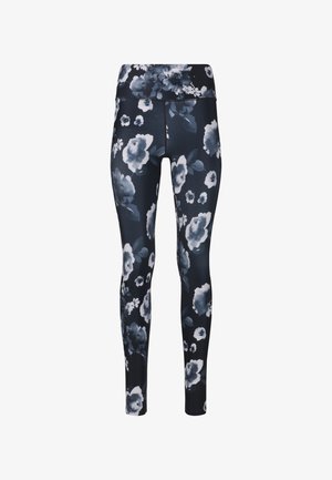 Leggings de sport floraux en bleu marine, avec des motifs floraux abstraits noirs et blancs, taille haute et tissu extensible et lisse.