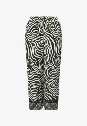 Czarno-kremowe spodnie w wzór zebry z elastycznym pasem, plisami i dekoracyjnym czarnym geometrycznym wykończeniem.