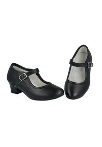 Zapatos Mary Jane negros con tacones bajos y correas en los tobillos que presentan hebillas plateadas, colocados en direcciones ligeramente diferentes sobre un fondo blanco.