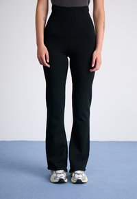 Nike Sportswear Tracksuit bottoms - black