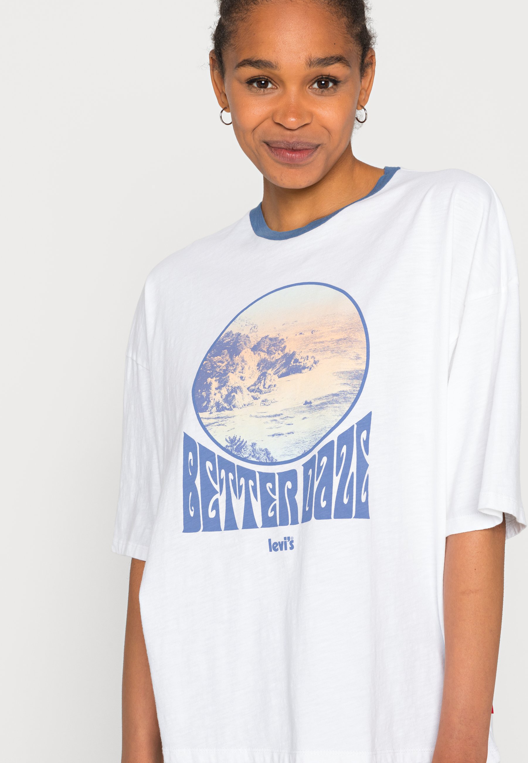 white tee with blue graphic