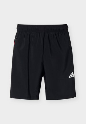 Μαύρο αθλητικό σορτς με ελαστική ζώνη μέσης και λευκό λογότυπο Adidas στο δεξί πόδι, σε απλό φόντο.