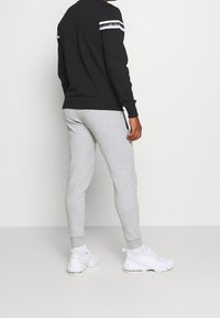 Ellesse Teplákové kalhoty - grey