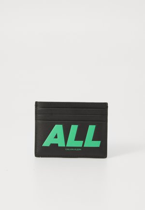 WORD GRAPHIC CAPSULE - Business card holder - black