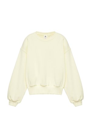 Sweat-shirt à manches longues couleur crème avec poignets, ourlet et encolure ronde côtelés, isolé sur fond blanc.