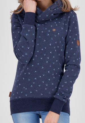 Felpa blu navy con collo a cappuccio, caratterizzata da un motivo a pois leggeri blu chiaro sparsi, polsini a coste e una piccola patch con logo sul petto.