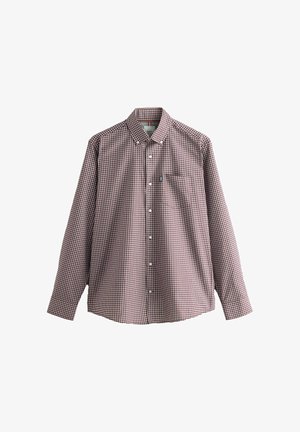Koszula zapinana na guziki z długim rękawem w brązowy i biały wzór w kratkę, z kieszenią na piersi i klasycznym kołnierzykiem. Wykonana z bawełny.