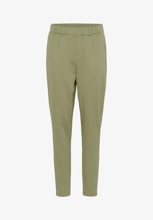 Pantalons ajustés vert clair avec une texture lisse, présentant des plis, une taille plate et des jambes fuselées, conçus pour le confort et un look moderne.