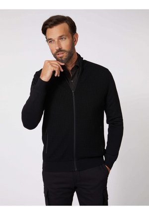 OSTENO - Vest - black