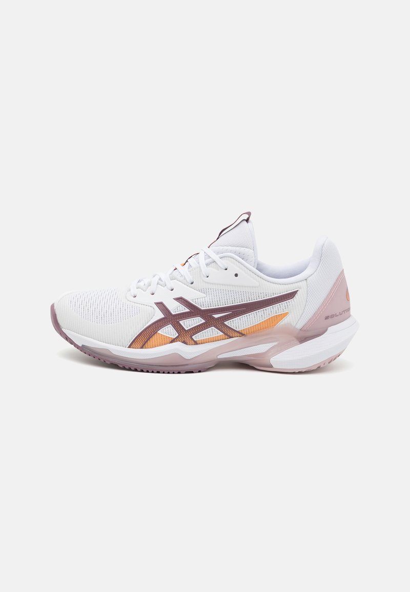 White athletic shoe with a breathable fabric upper, purple and metallic accents, padded collar, and rubber outsole. Sleek, modern design.