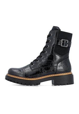 Black leather lace-up boot with chunky tread sole, side buckle detail, and stitched brown welt, viewed from the side on a white background.