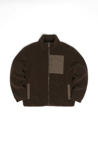 Brown fleece jacket with high collar, full front zipper, and a beige patch pocket on the left chest; features side pockets and soft texture.