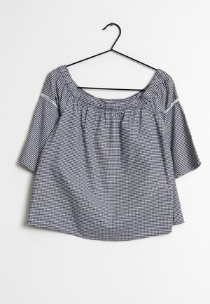 Black and white gingham blouse with a wide neckline and three-quarter sleeves, made from lightweight fabric, featuring gathered detailing at neckline.