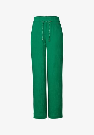 Pantalones verdes, ligeros y de pierna ancha, hechos de un tejido texturizado con cintura elástica y cordón ajustable. No hay bolsillos visibles.