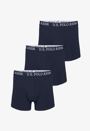 Tengerészkék pamut boxer alsó, puha rugalmas derékkal, amelyen a "U.S. POLO ASSN." felirat fehér színben szerepel. Karcsú szabású és sima tapintású.
