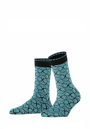 Ein Paar türkisfarbene Socken mit einem schwarzen Blumenmuster, einem schwarzen gerippten Bündchen und einer glatten Textur.