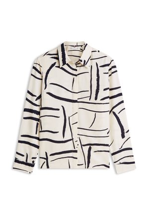 Langärmliges Hemd aus cremefarbenem Stoff mit markanten, abstrakten schwarzen Pinselstrichmustern. Klassischer Kragen und Knopfverschluss. Glatte Textur.