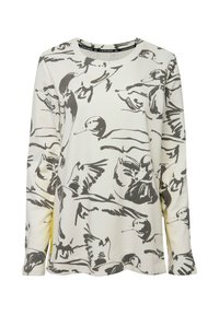 Chemise blanche à manches longues avec un design imprimé d'oiseau noir, col rond, texture douce et coupe décontractée.