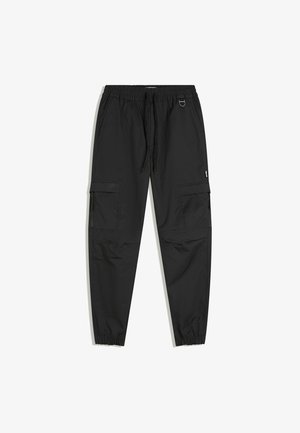 Schwarze Cargo-Hosen mit elastischem Bund und Bündchen, Fronttaschen, seitlichen Reißverschlusstaschen, Kordelzug und kleinem Metall-D-Ring-Detail.