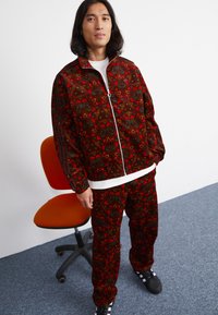 veste adidas noir et jaune