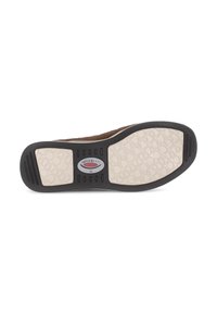 Bruine schoenzool met een textuur van wit en zwart rubberpatroon, voorzien van een centraal logo en rechthoekige groeven voor grip.