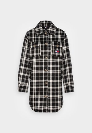 Black and white plaid long sleeve shirt jacket with button front and two chest pockets, one featuring a small Tommy Jeans logo patch.