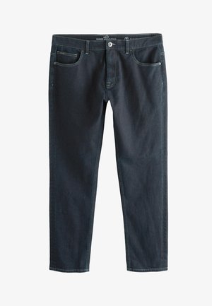 Tumed sinised denim püksid kitsaste lõikega, viie tasku disainiga, kontrastsete õmblustega ja standardse lukuga sulgemisega. Sile tekstuur.