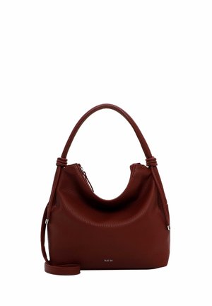 Red leather handbag with a textured finish, a curved top, a single handle, and an adjustable strap. Zipper closure and logo detail on base.