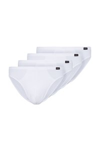 Quatre paires de slips en coton blanc avec une texture lisse, une taille élastique et une étiquette de logo noire sur le côté de chaque slip.