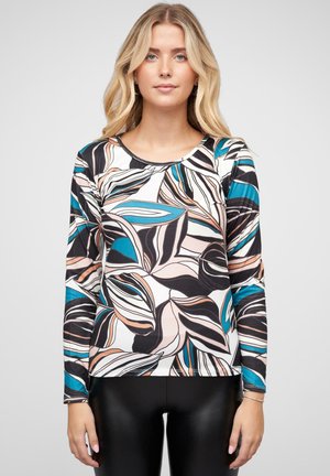 Chemise à manches longues multicolore avec un motif floral, accentuée de noir, bleu et pêche. Fabriquée à partir d'un tissu lisse et extensible.