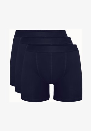 Tre par navy blue boxershorts lavet af blød bomuld. De har en glat talje og en formsyet pouches for komfort.