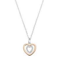 Silver chain necklace with a rose gold heart pendant enclosing a smaller heart outlined with clear gemstones.