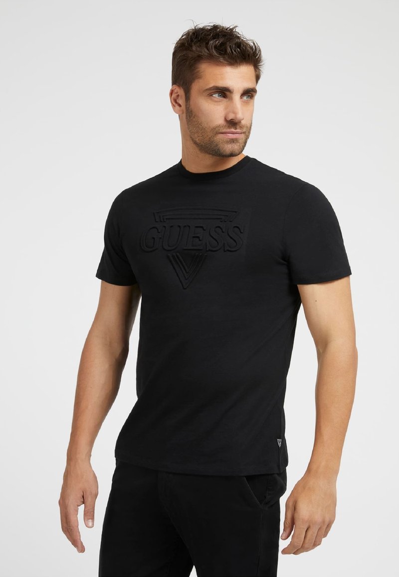 Guess EMBOSSED TEE TShirt print schwarz Zalando.at
