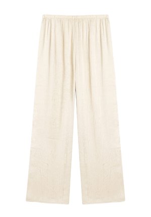 Pantalons à jambes larges de couleur crème, fabriqués en tissu texturé avec une taille élastique. Présentent une coupe ample et droite, atteignant les chevilles.