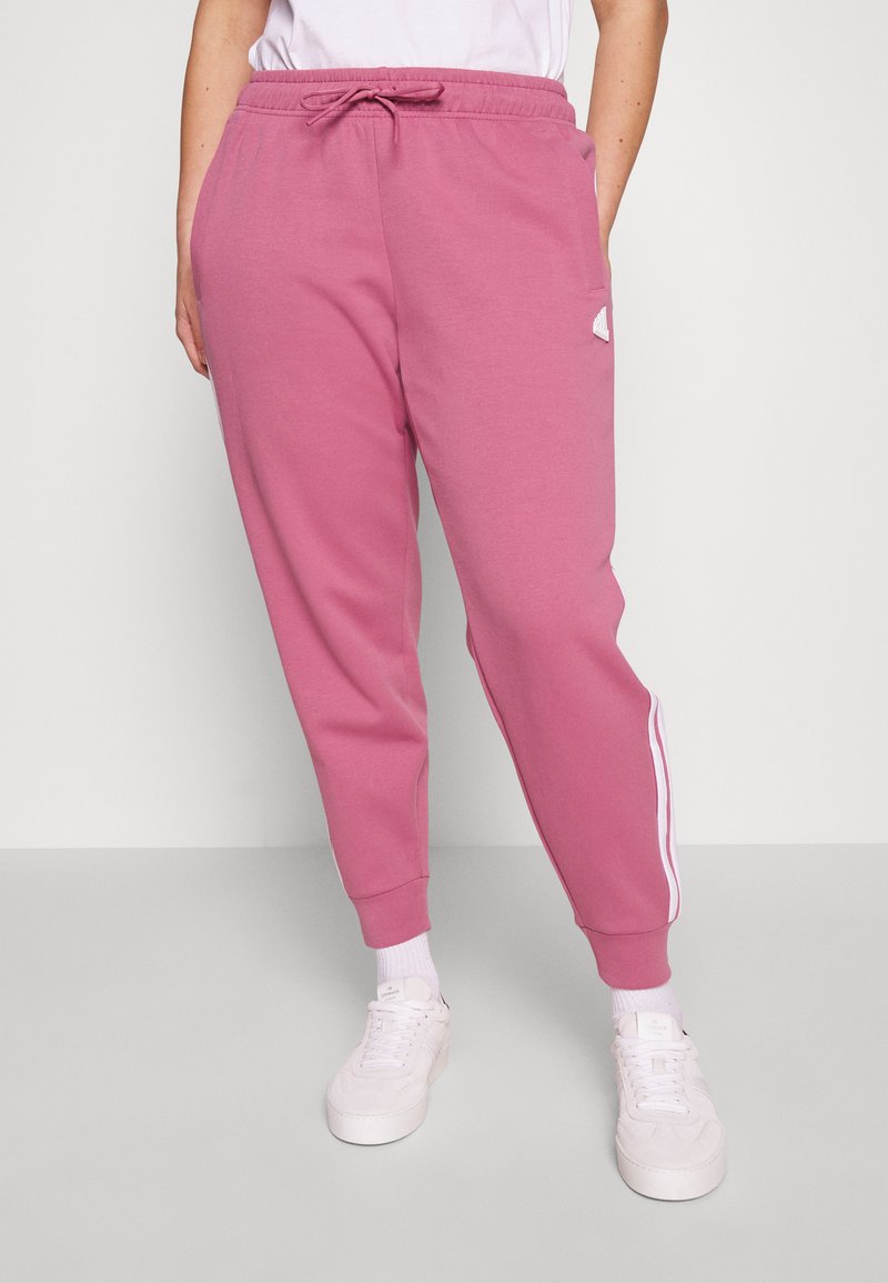 adidas Sportswear Tracksuit bottoms pink/pink Zalando.ie