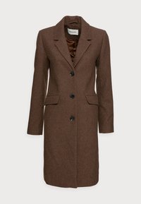 Brauner knielanger Wollmantel mit Reverskragen, drei schwarzen Knöpfen, aufgesetzten Taschen und braunem Satinfutter.