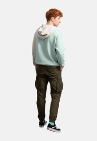 KAFT UNISEX DESIGN REGULAR FIT - Felpa con cappuccio - mint