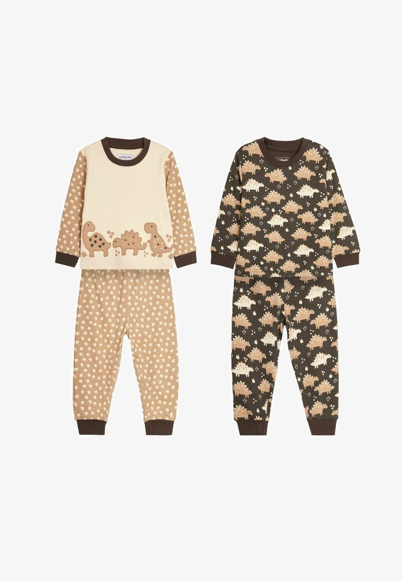 Två set barnpyjamasar med mjukt bomullstyg. Det ena har en beige överdel med dinosauriemotiv och beiga prickiga byxor; det andra har en mörk botten med dinosauriemönster.
