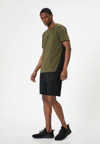 Koton SPORT - T-shirts print - khaki