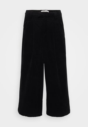Sorte corduroy culotter med bred bendesign, der har en tekstureret overflade og en høj elastisk talje. Skræddersyede plissee-detaljer.