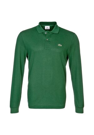 Polo shirt verde a maniche lunghe realizzato in un tessuto morbido. Presenta una chiusura con tre bottoni e un piccolo logo ricamato sul petto.