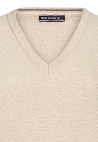 Kreemivärviline V-kaelusega kampsun, millel on tekstuuriga mesitaru muster. Rippuv krae ja silt, millel on nähtav brändinimi "FELIX HARDY".