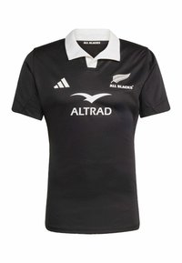 Schwarzes Rugby-Trikot mit weißem Kragen, versehen mit dem All Blacks-Logo und dem in Weiß gedruckten Sponsor "ALTRAD". Hergestellt aus strukturiertem Stoff.