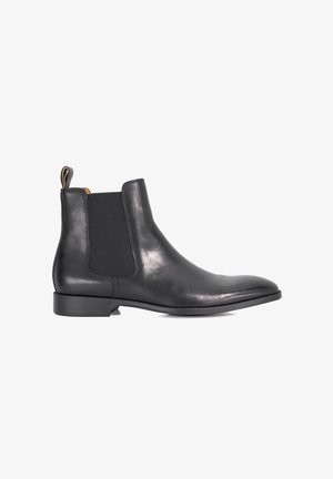 Black leather Chelsea boot with elastic side panels, rounded toe, low stacked heel, and a pull tab at the back for easy wear.