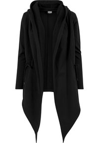 Gilet en tricot noir, doux, avec un col châle, à l'avant ouvert, à manches longues et avec des cordons à la taille. Ourlet ondulant avec une finition texturée.
