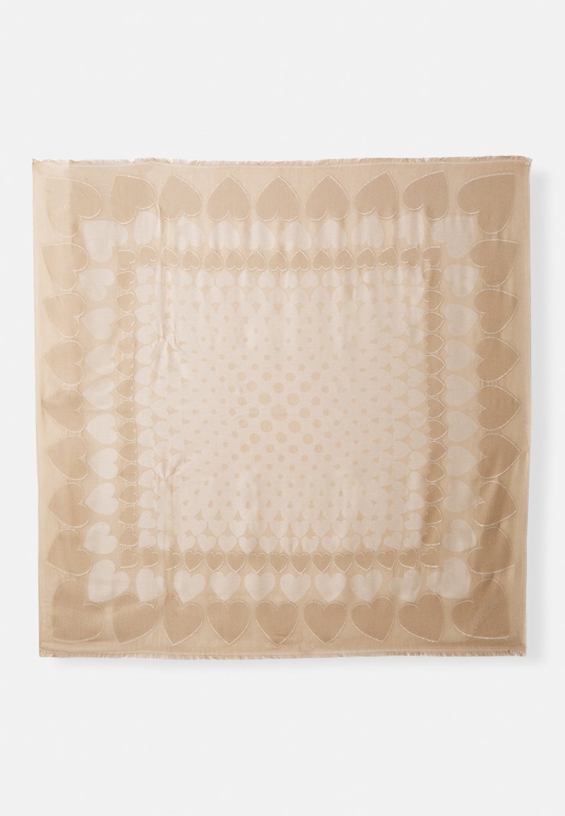 Light beige scarf featuring a heart pattern and circular dots, with fringed edges and a soft, textured finish.