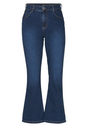 Dunkelblaue Jeans mit Schlag, hoher Taille, sichtbaren Nähten, Fronttaschen und einem Saum, der am Boden ausgestellt ist.