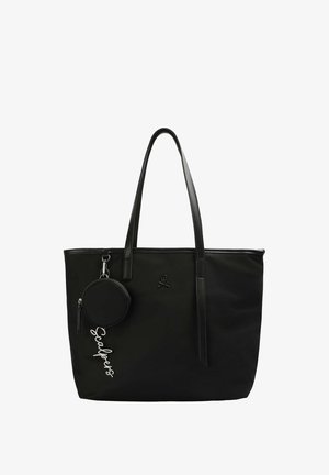 Black tote bag with two shoulder straps, logo detail, and a detachable round pouch featuring silver lettering. Smooth, durable material.