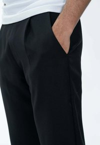 FRILIVIN Pantalon de survêtement - noir