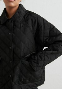 aim’n® QUILTED FEMME - Light jacket - black